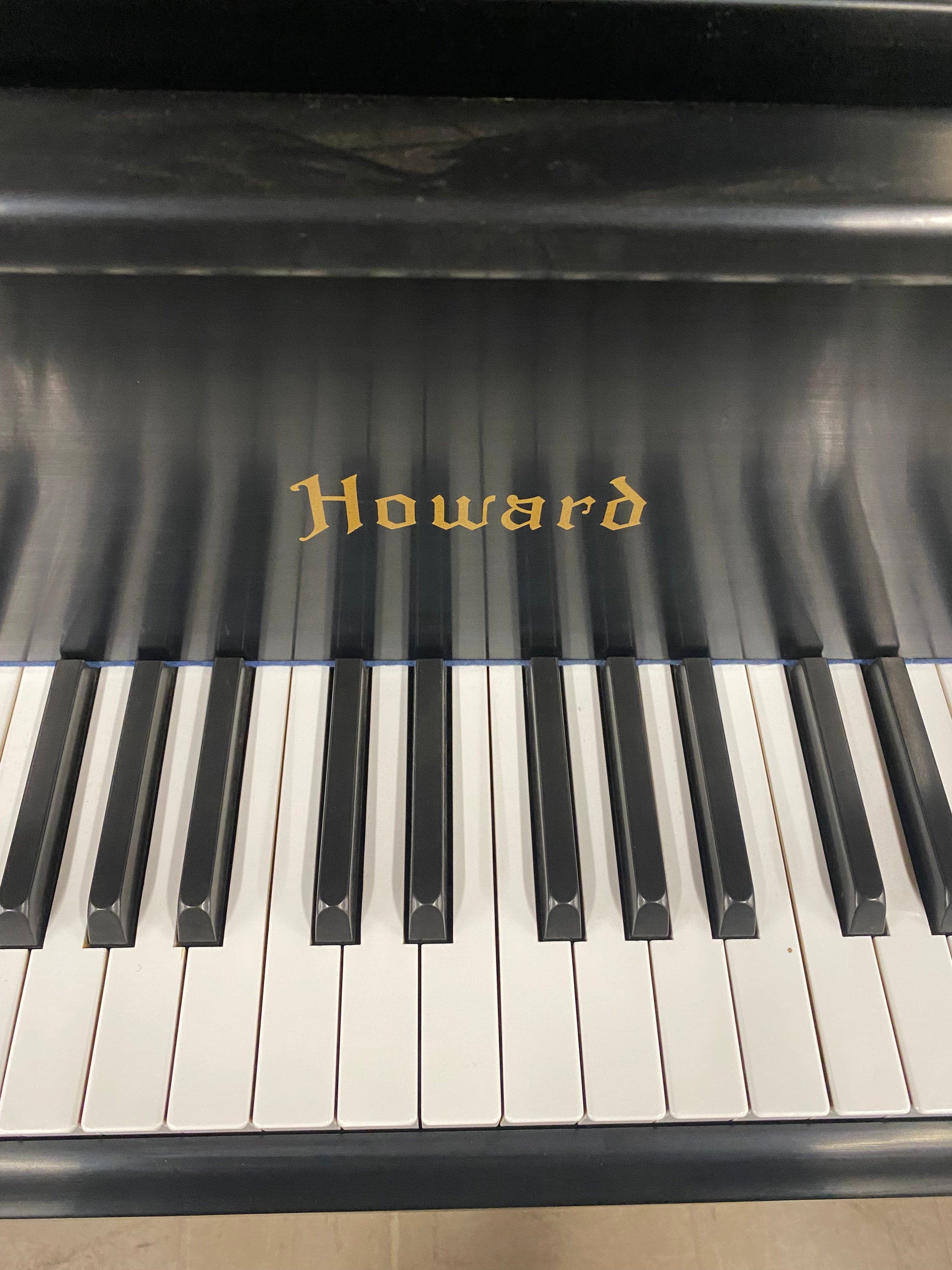 Howard (Kawai) 5'9" grand in ebony satin. Made in Japan